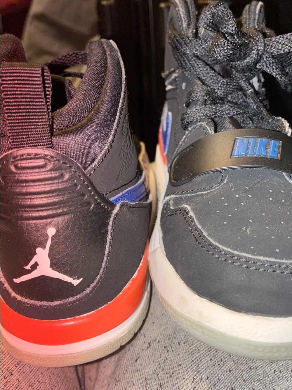 Nike Black Sneakers with Red and Blue Accents